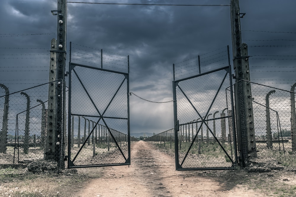 black metal frame on brown dirt road