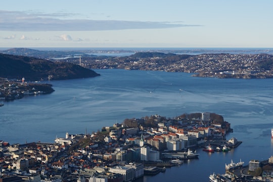 aerial view of city buildings near body of water during daytime in Bergen Norway