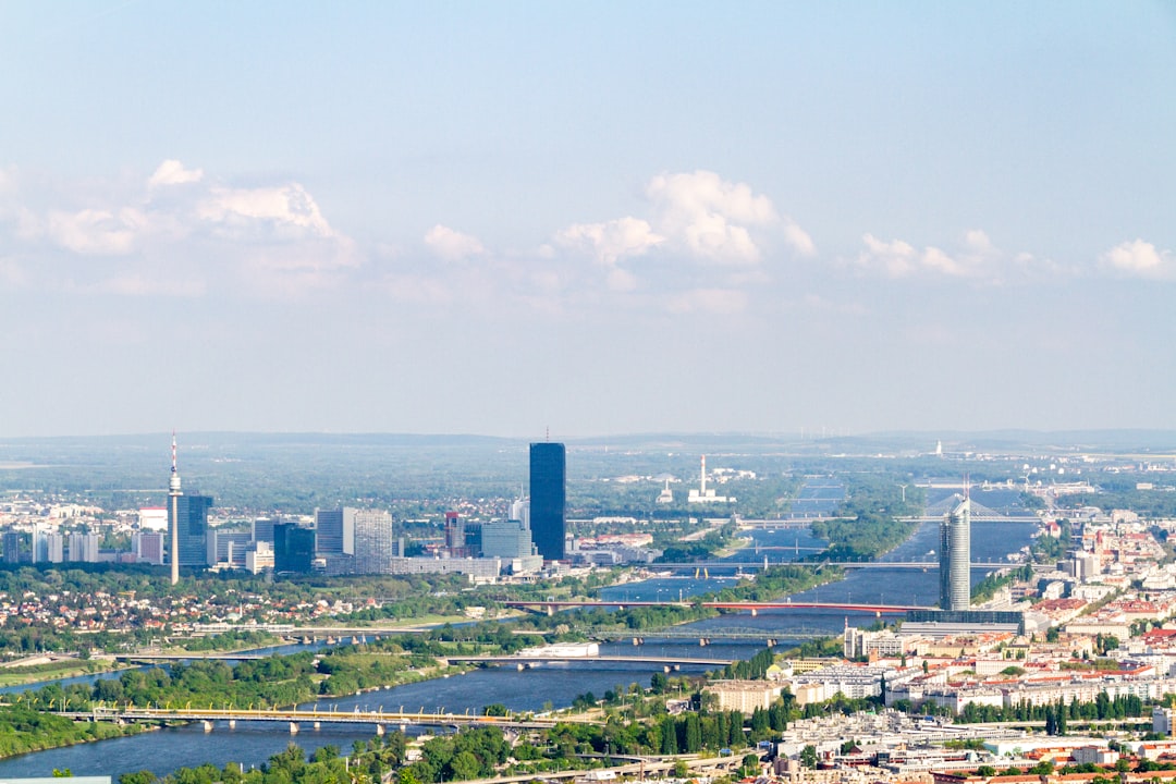 city buildings under white clouds during daytime