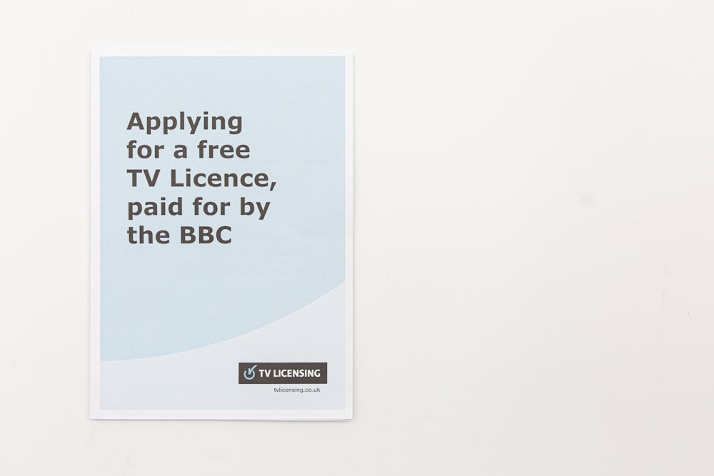 a brochure with the words applying for a free tv licence, paid for