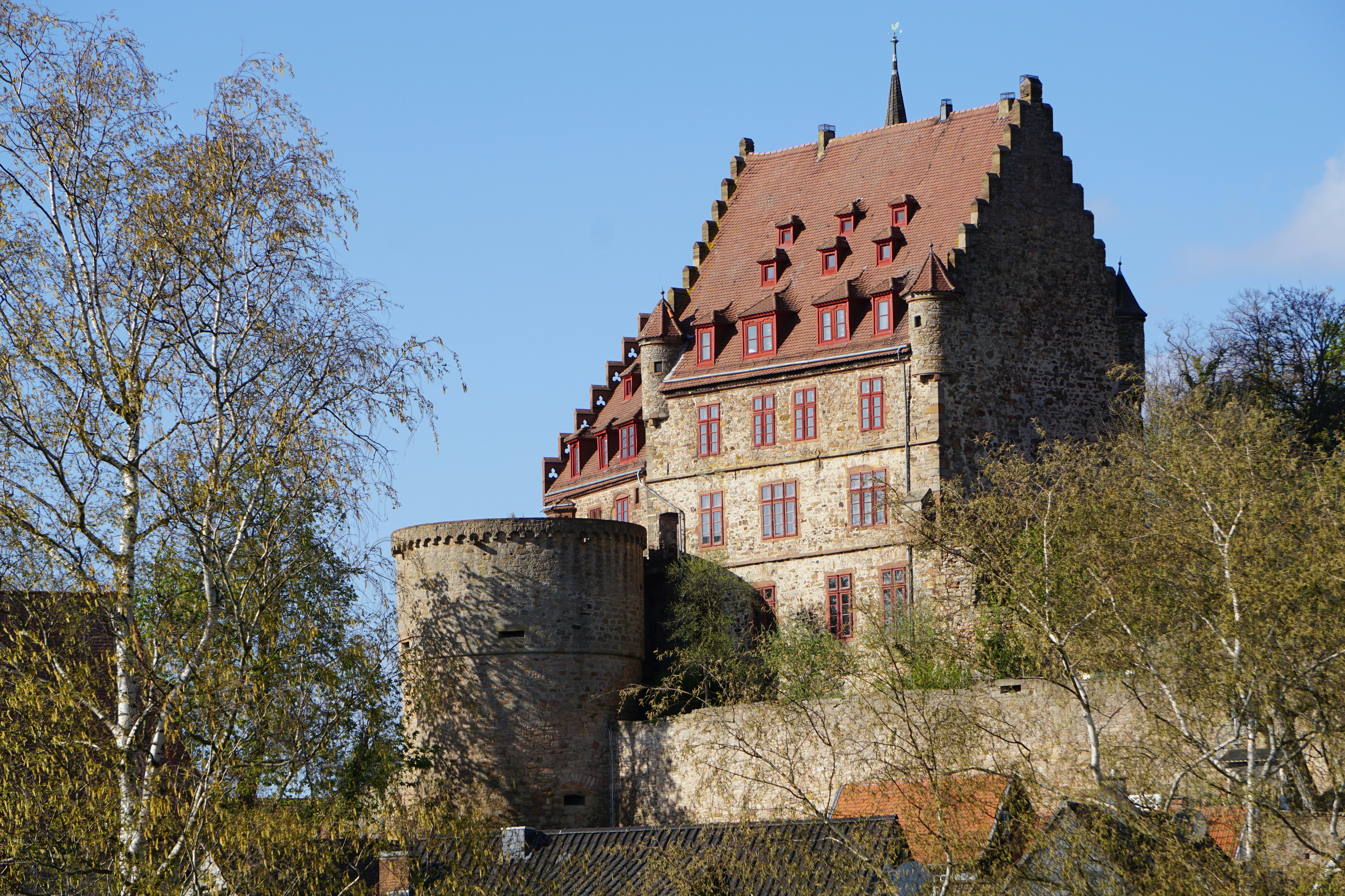 brown and gray concrete building, Medieval Schweinsberg castle, goes back to the 13th century. It