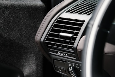 black and brown car air vent