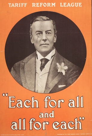 A vintage political poster with an image of a man wearing formal attire, including a monocle and a suit with a boutonniere. He is surrounded by text that reads 'Each for all and all for each.' The background is orange, and the words 'Tariff Reform League' are displayed at the top of the poster.