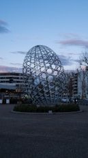 clear glass ball on gray concrete floor