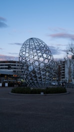 clear glass ball on gray concrete floor