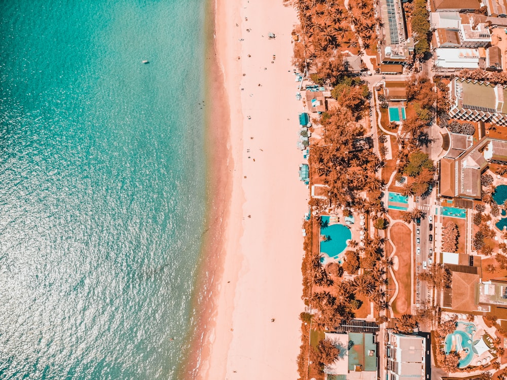 aerial view of city near body of water during daytime