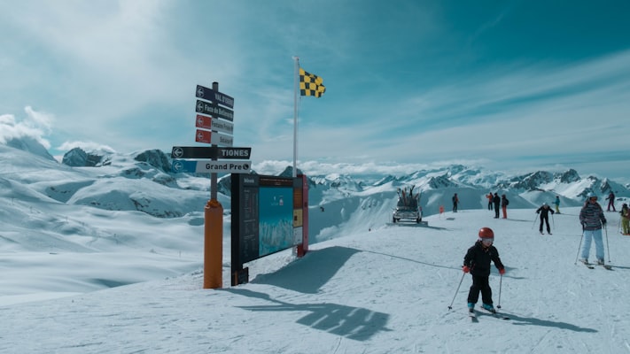 Skiers on the village piste in Val d'Isere