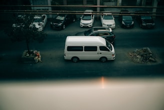 white car on road during rain