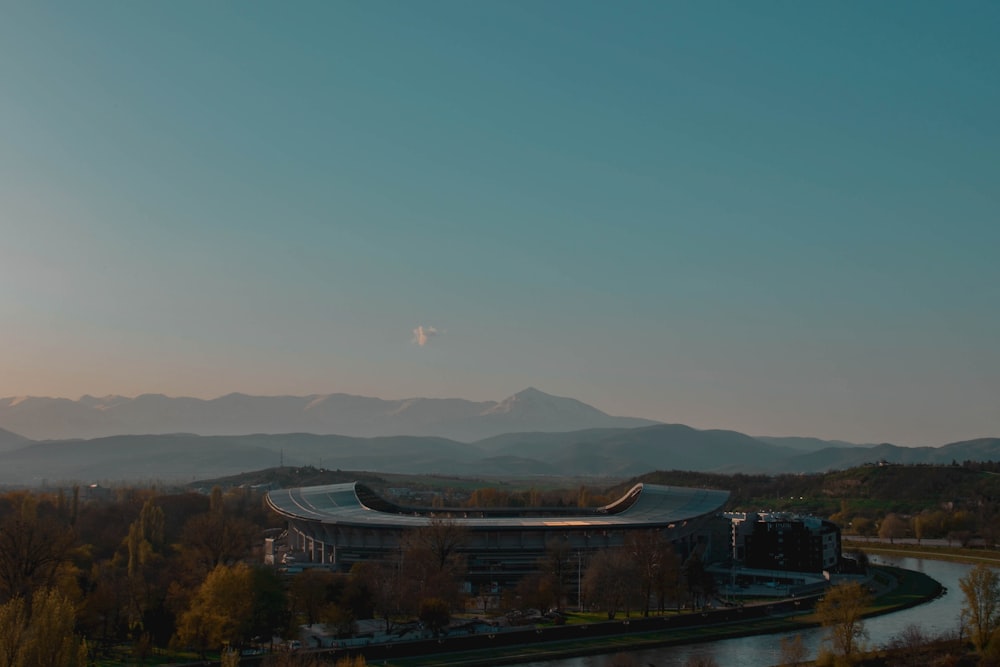 green trees and mountains during daytime