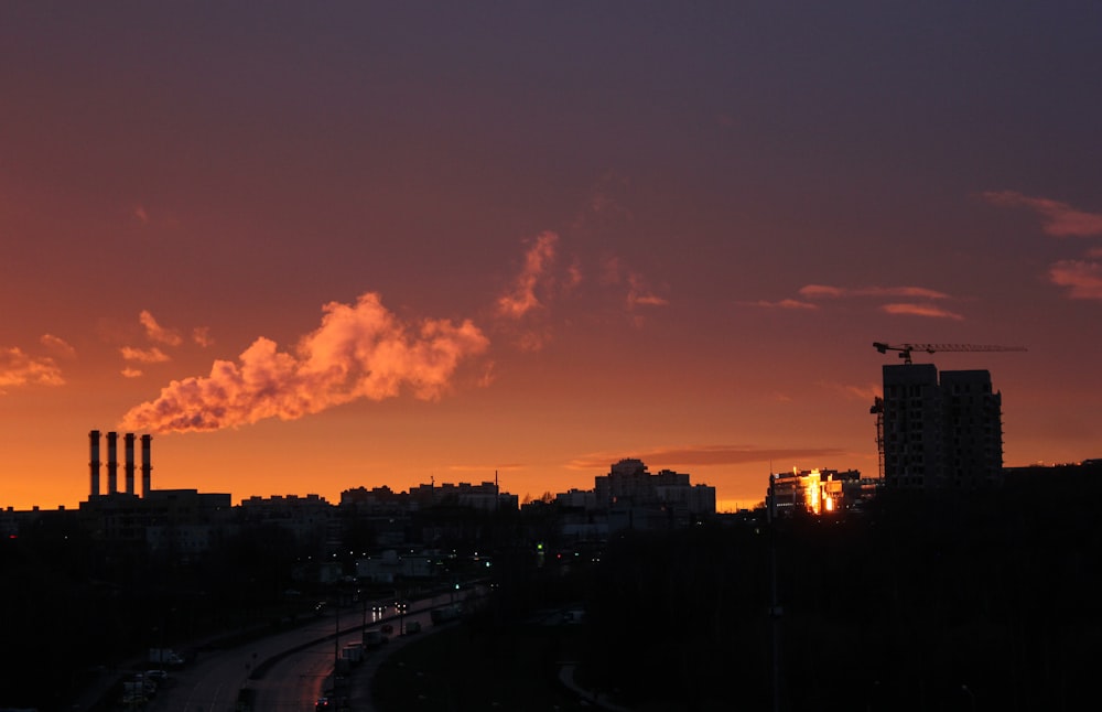 silhouette of buildings during sunset