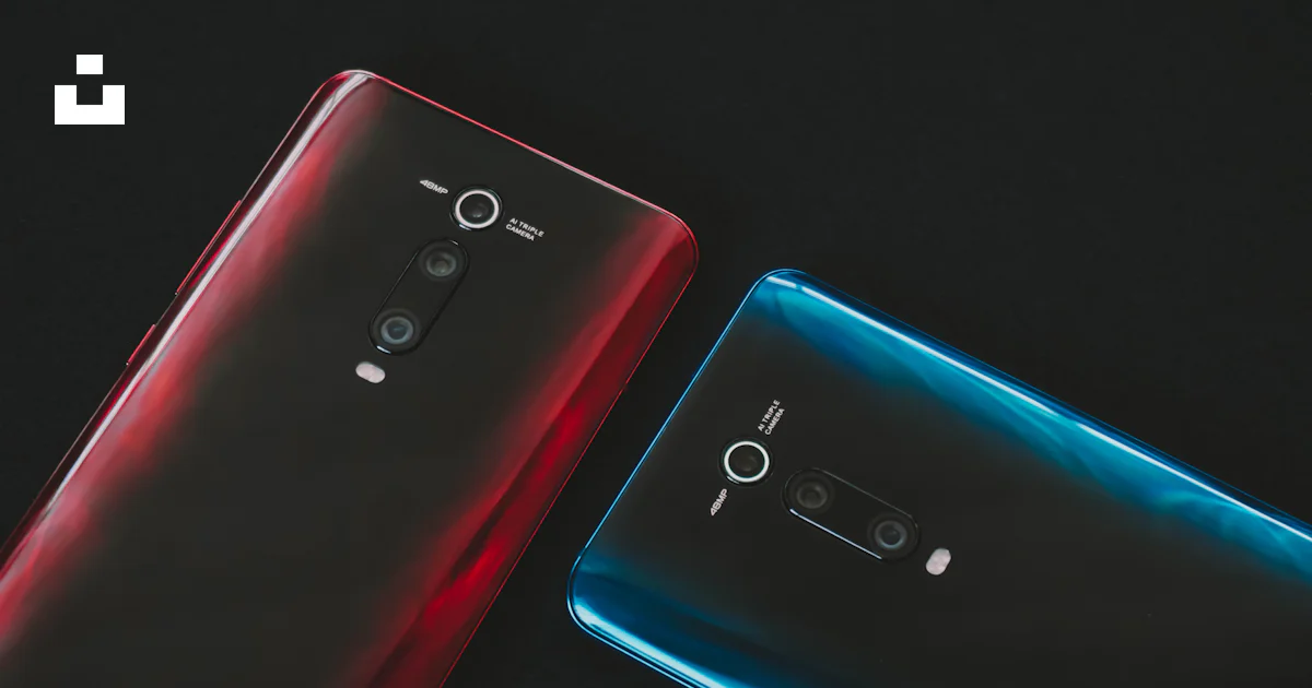 Two red and blue android smartphones photo – Free Brown Image on Unsplash