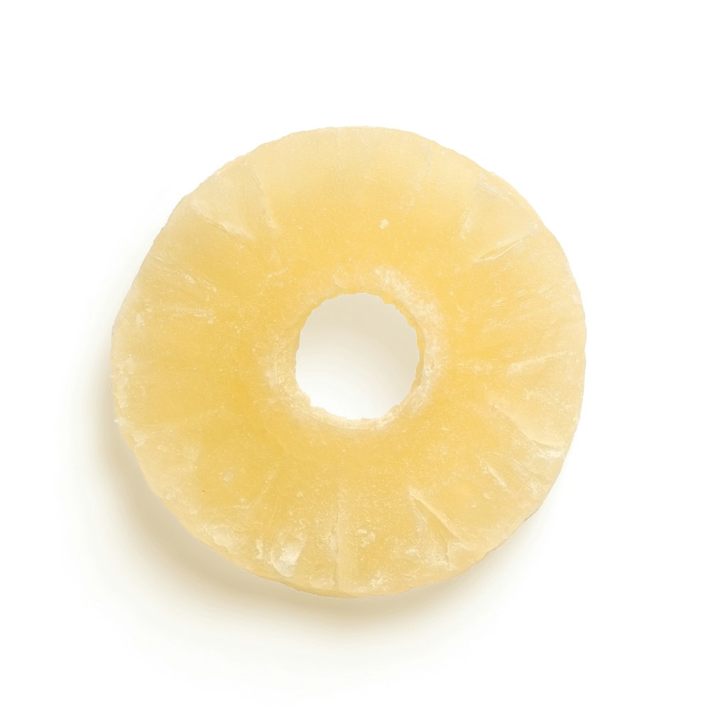 yellow doughnut on white surface