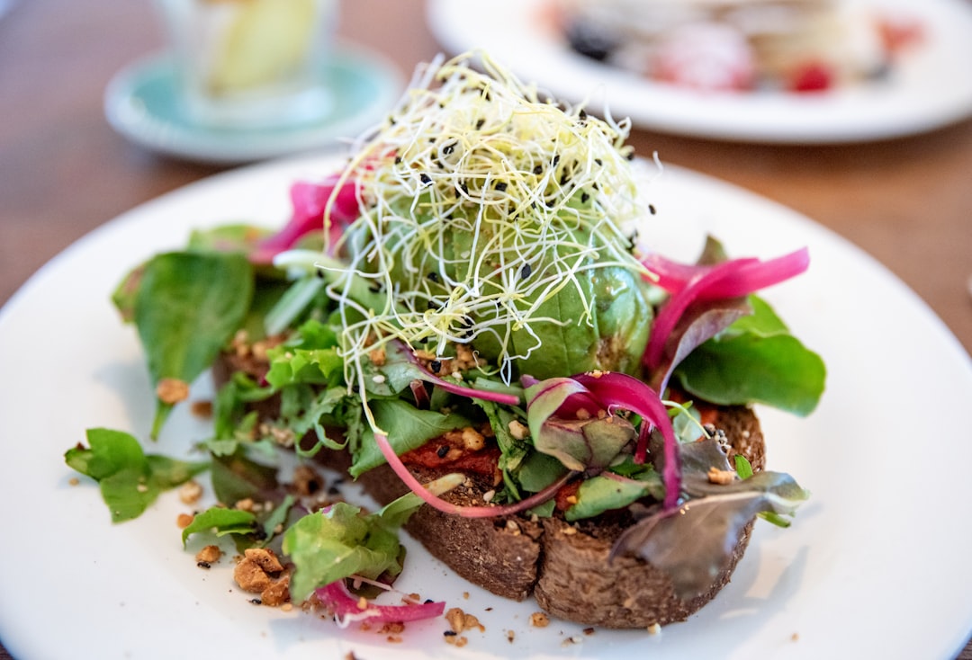 green vegetable on white ceramic plate, From the breakfast club Amsterdam