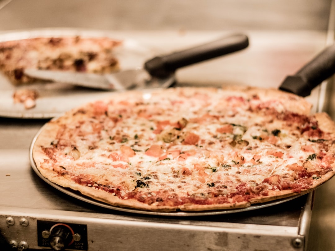 pizza on white ceramic plate