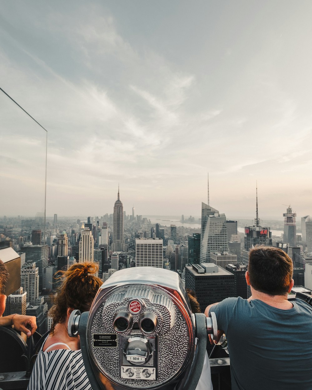 people on top of building during daytime