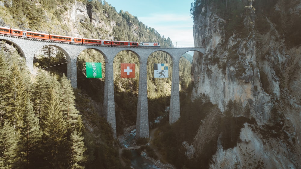 gray concrete bridge over river