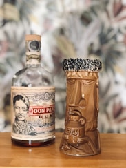 jack daniels bottle on brown wooden table