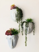 red roses on white ceramic vase