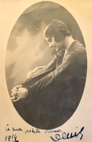 A sepia-toned photograph of a World War I nurse tending to wounded soldiers in a makeshift field hospital.