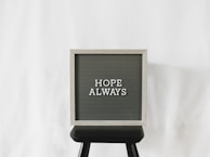a sign that says hope always on it