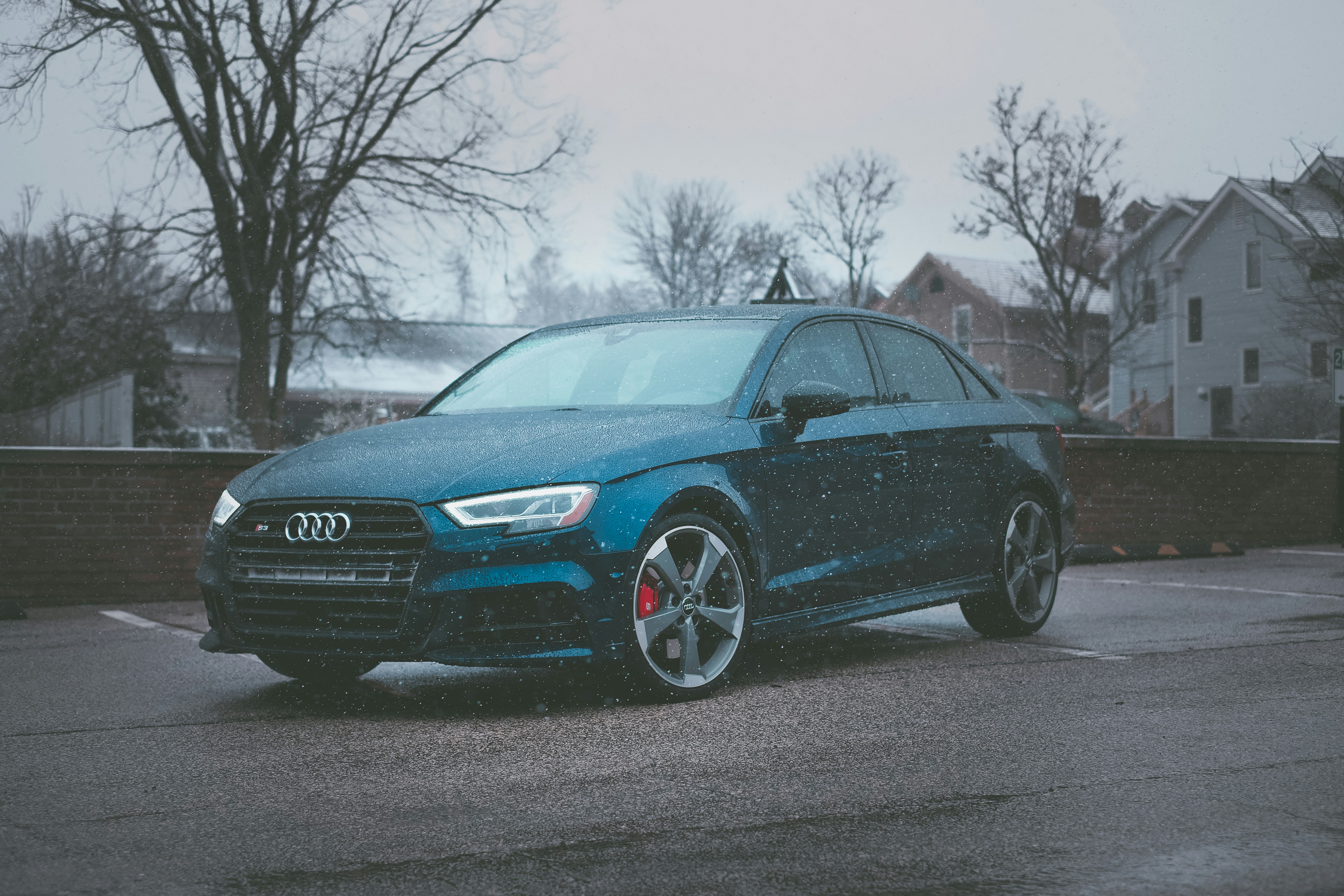 blue audi a 4 on road