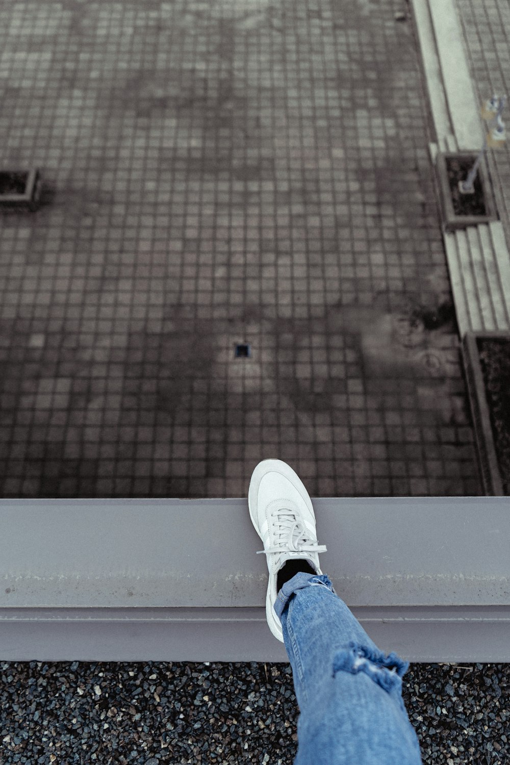 person in blue denim jeans and black and white nike sneakers photo – Free  Zaxo Image on Unsplash