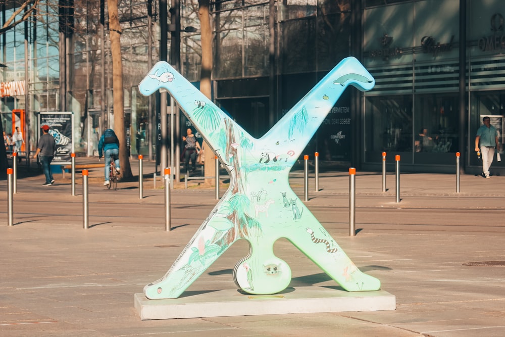 blue and white airplane statue