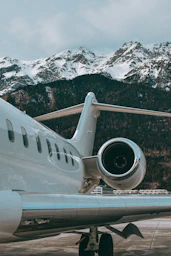 a large jetliner sitting on top of an airport tarmac