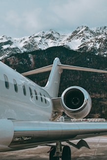 a large jetliner sitting on top of an airport tarmac