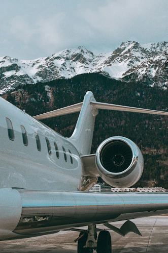 a large jetliner sitting on top of an airport tarmac
