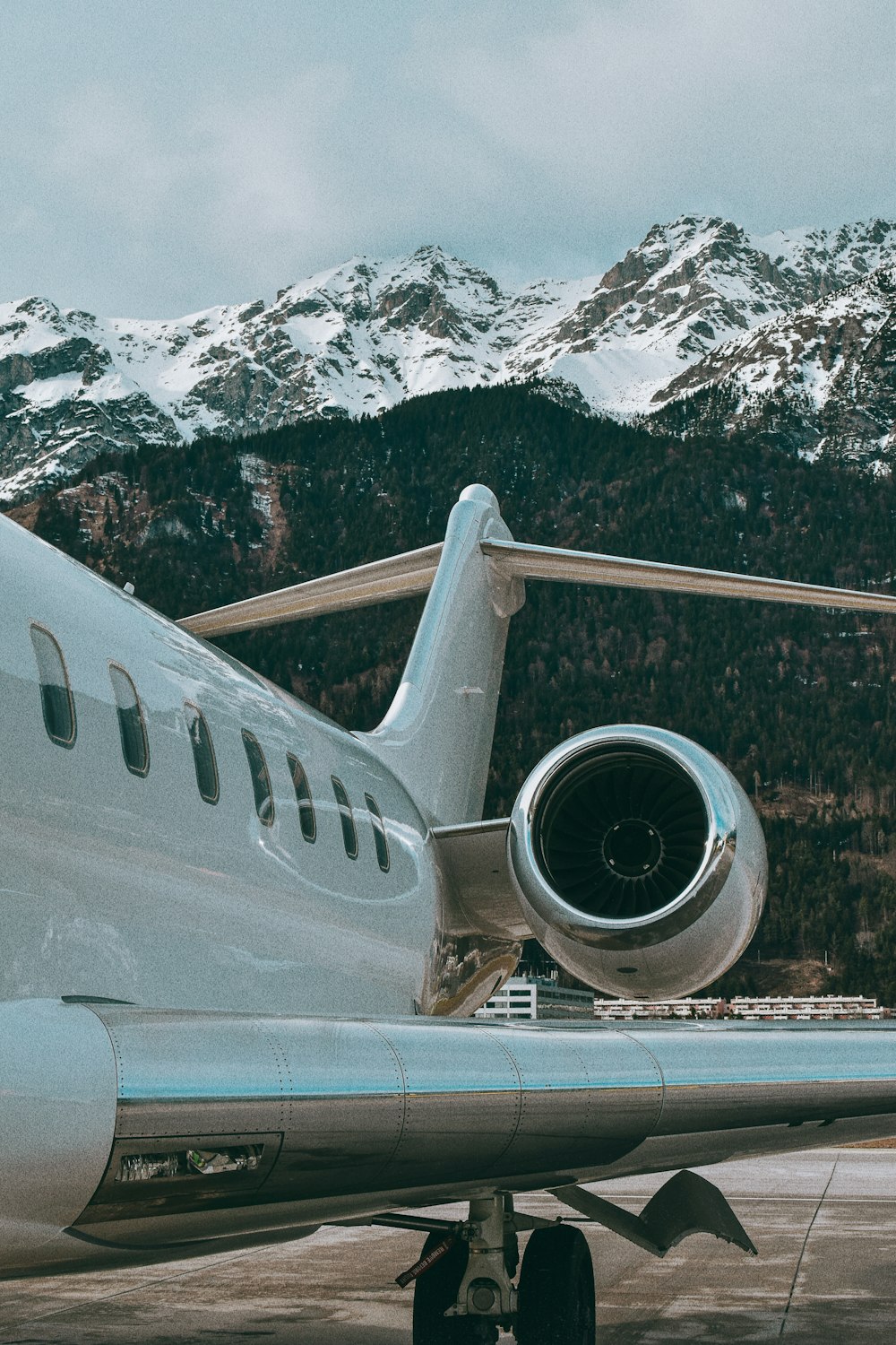 a large jetliner sitting on top of an airport tarmac