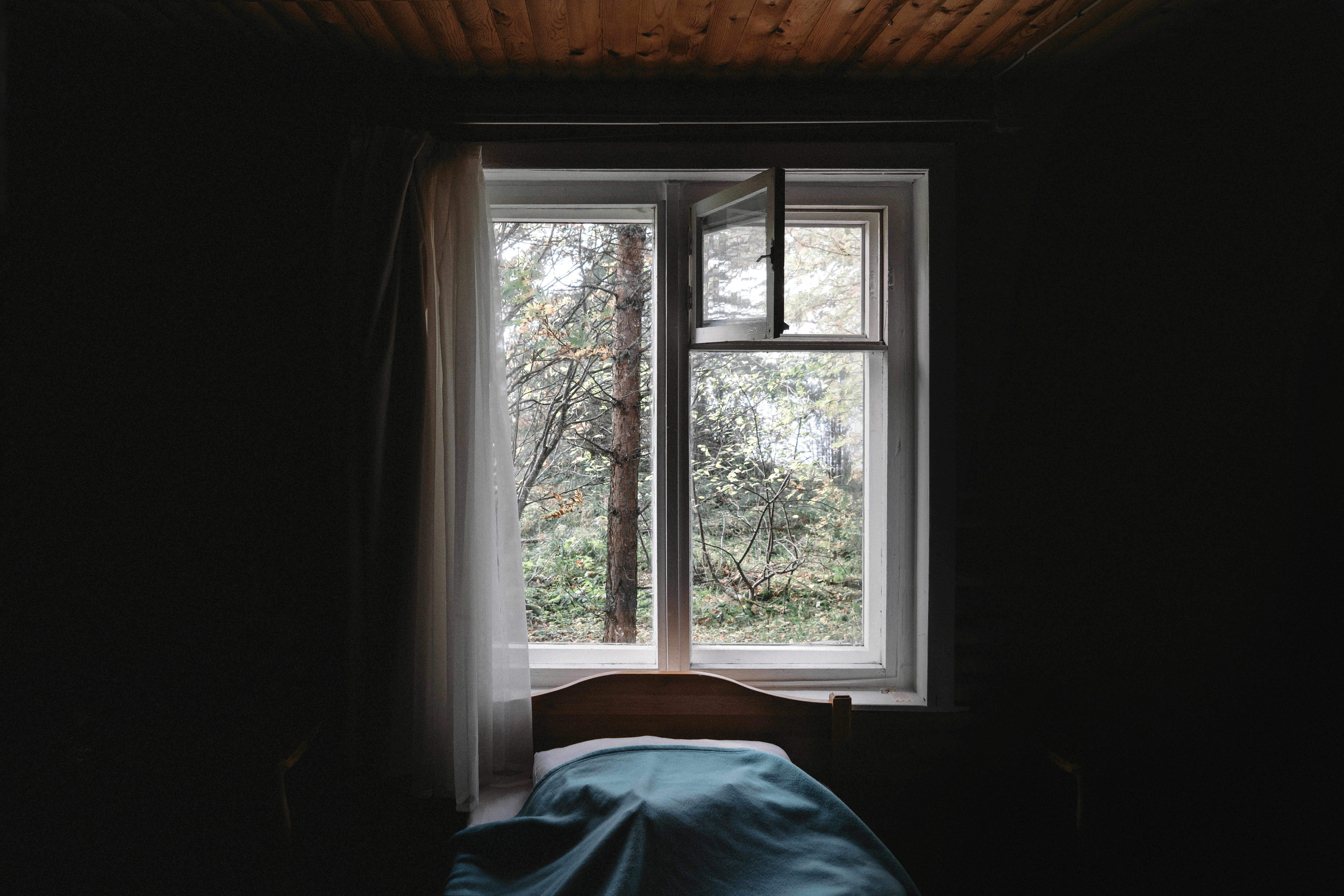 white wooden framed glass window