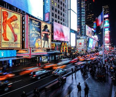 people walking on street during night time