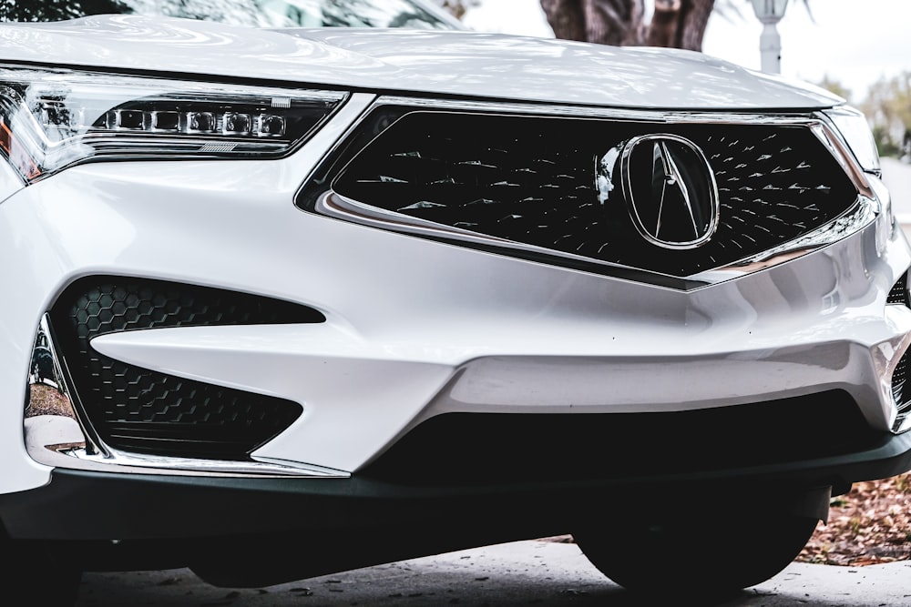 white mercedes benz car on road during daytime