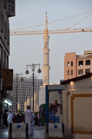 A vibrant street scene in Riyadh showcasing traditional and modern architecture blending together.