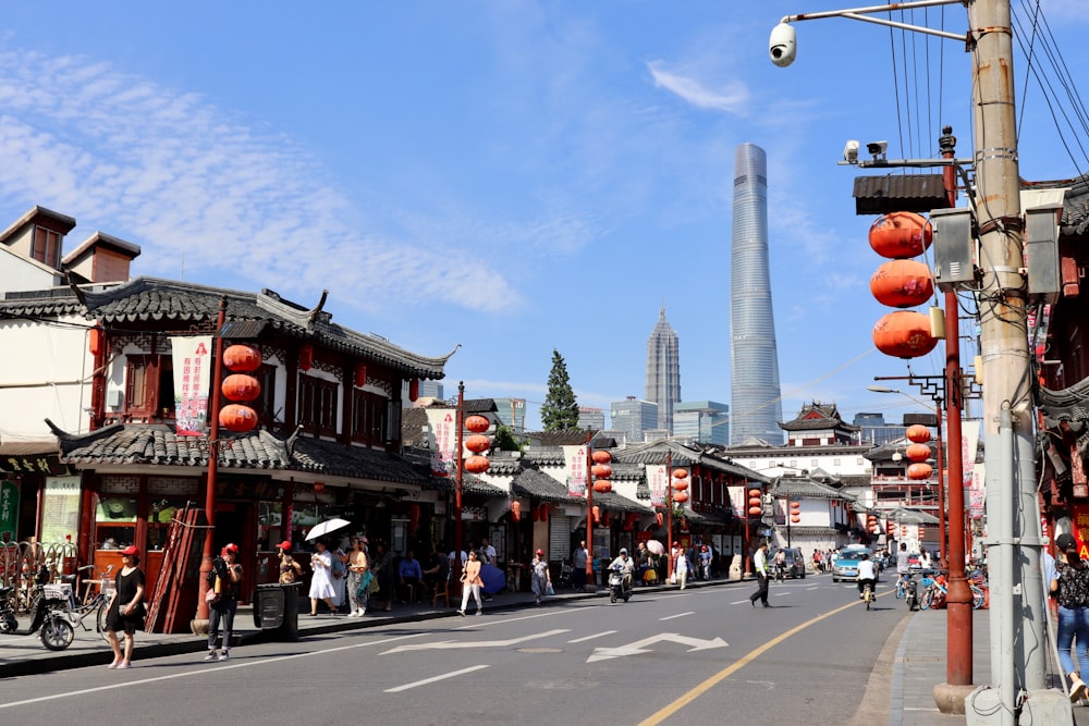 people walking on street near buildings during daytime