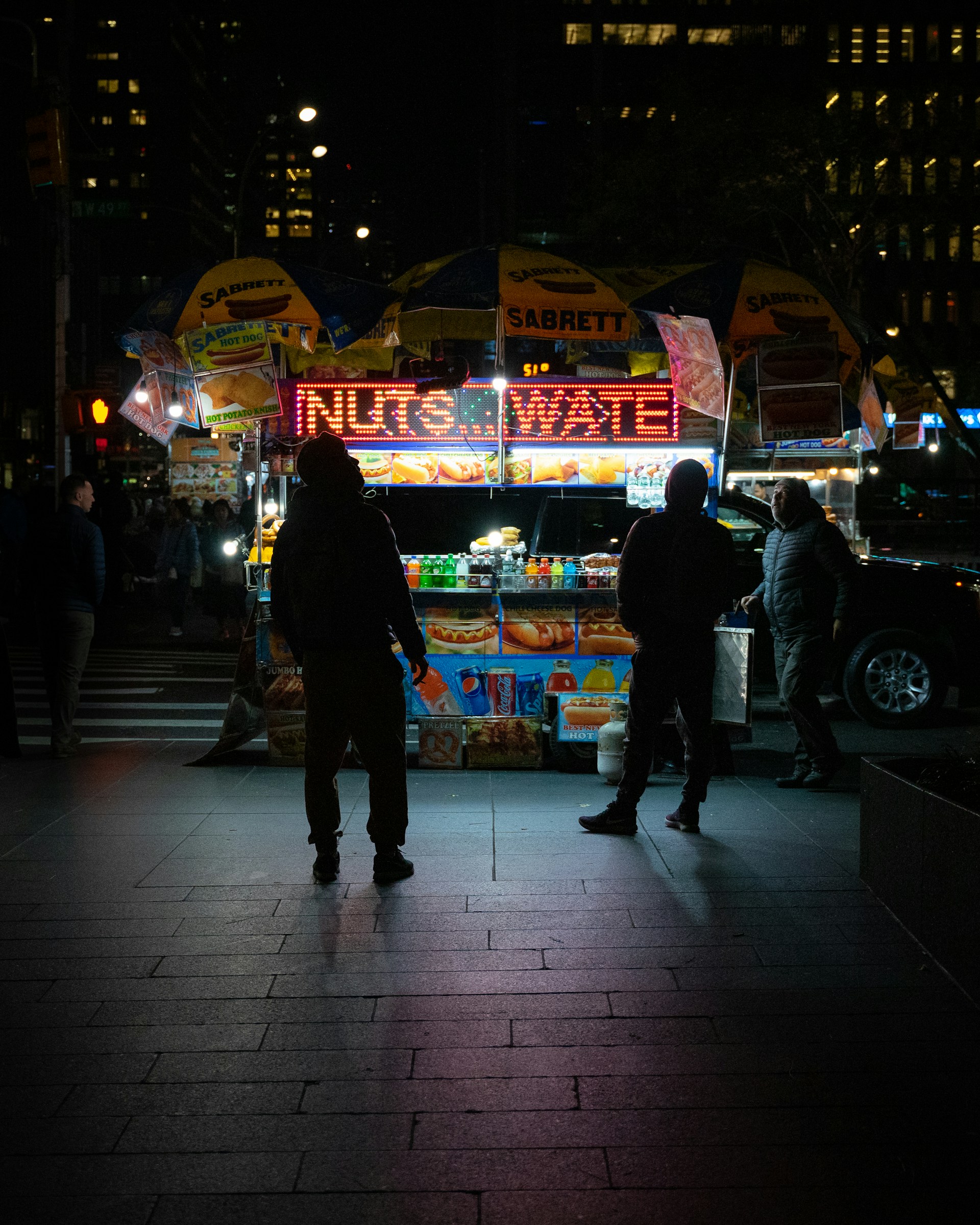 woman wearing yellow long-sleeved dress under white clouds and blue sky during daytime