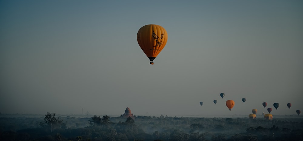 yellow hot air balloon in the sky