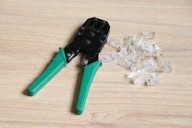 green and black metal tool
