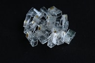 Rows of blue and gray connectors neatly displayed on a modern workbench.