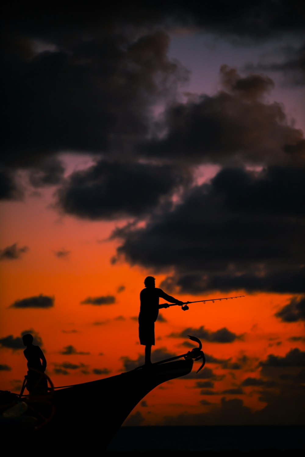 silhouette of people riding bicycle during daytime