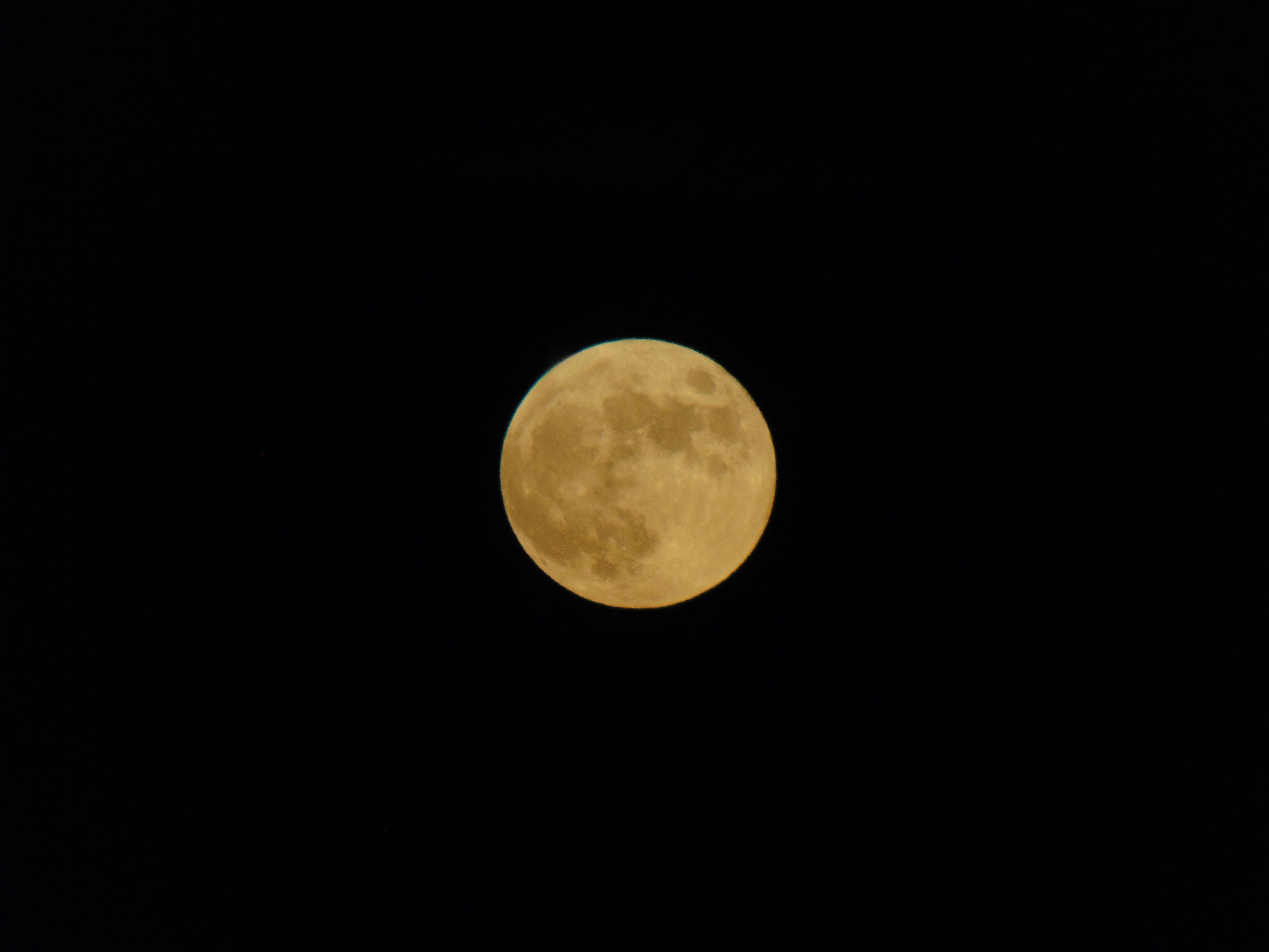 Amateur moon shot with a Panasonic HC-V500 camcorder.