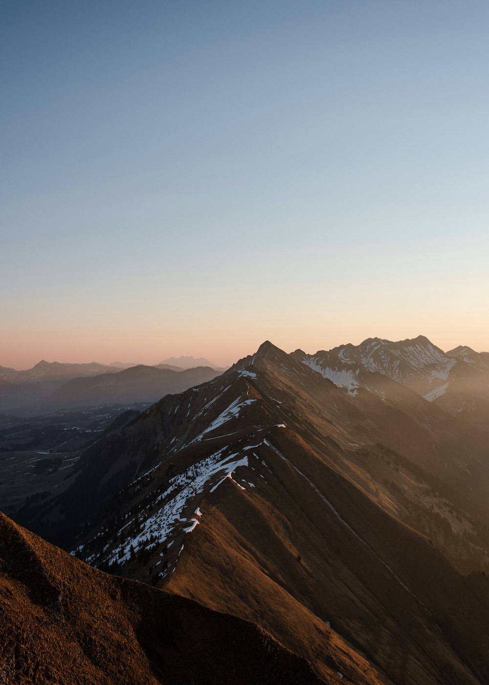 a person standing on top of a mountain