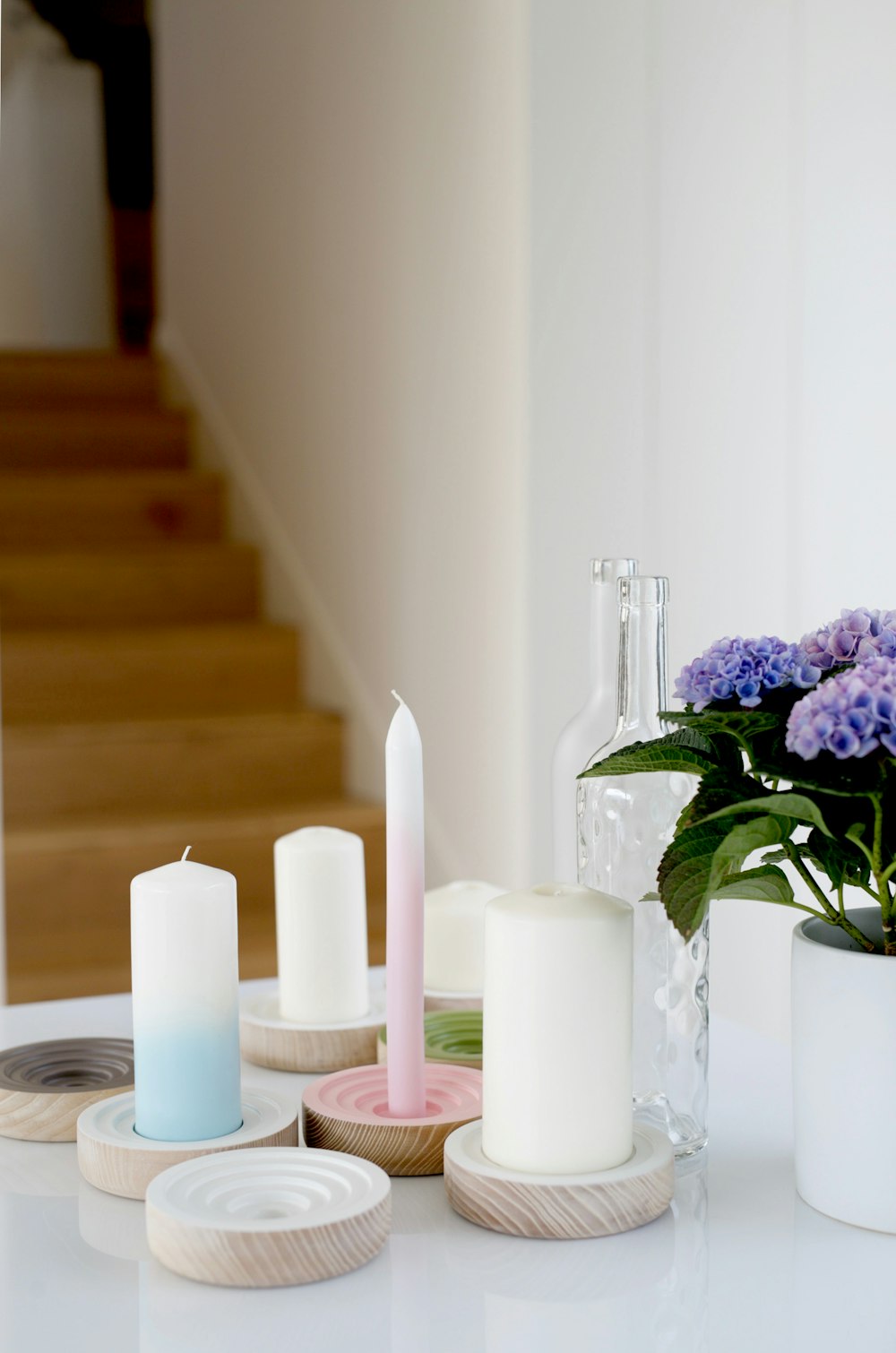 white pillar candles on clear glass candle holder photo – Free Candles  Image on Unsplash