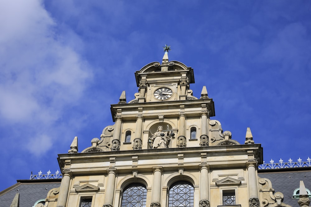 a large building with a clock on the top of it