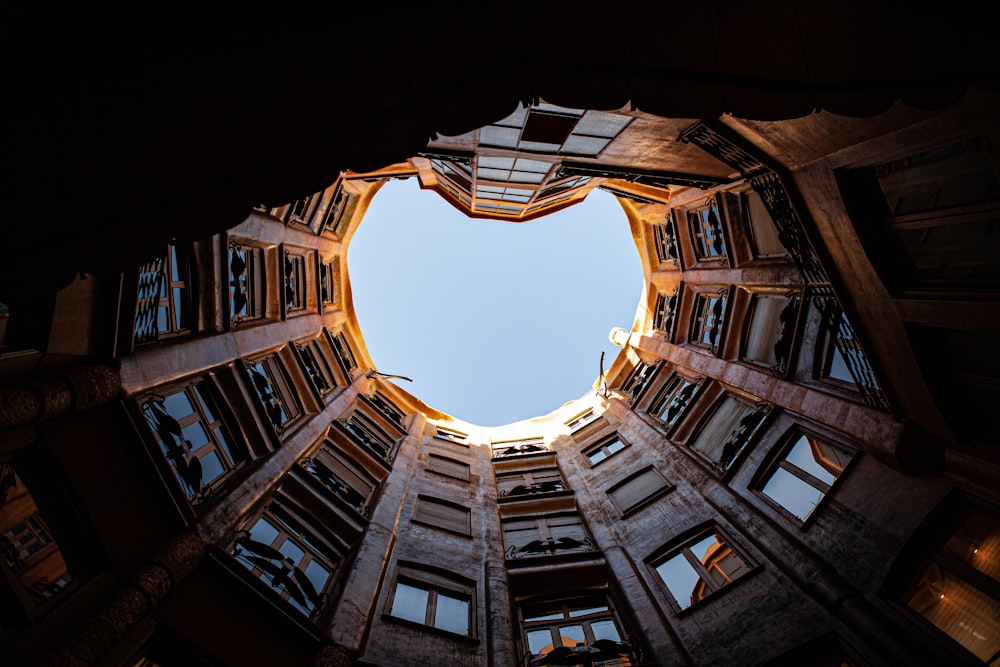 low angle photography of brown concrete building