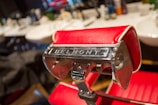 A close-up of a classic barber chair in the shop.