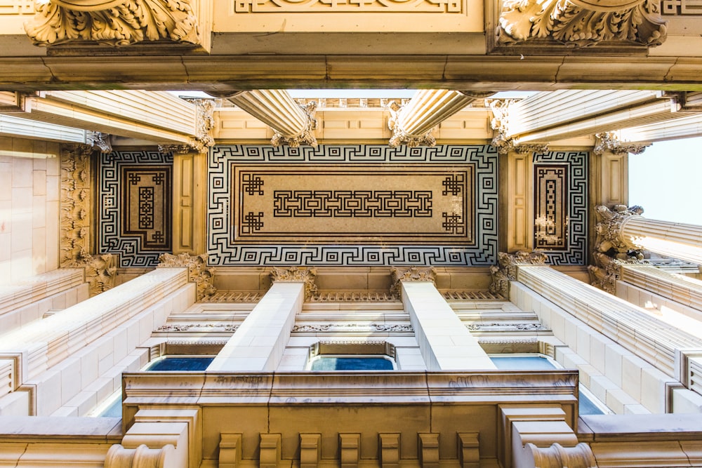 a view of the ceiling of a building from below