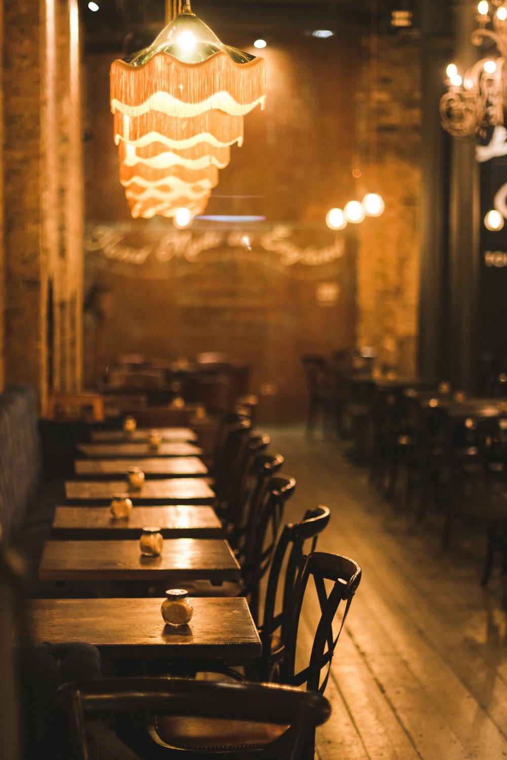 brown wooden chairs and tables