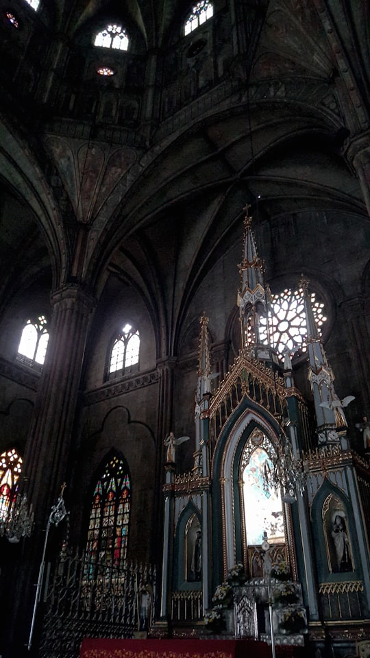 low angle photography of cathedral interior in San Sebastian Church Philippines